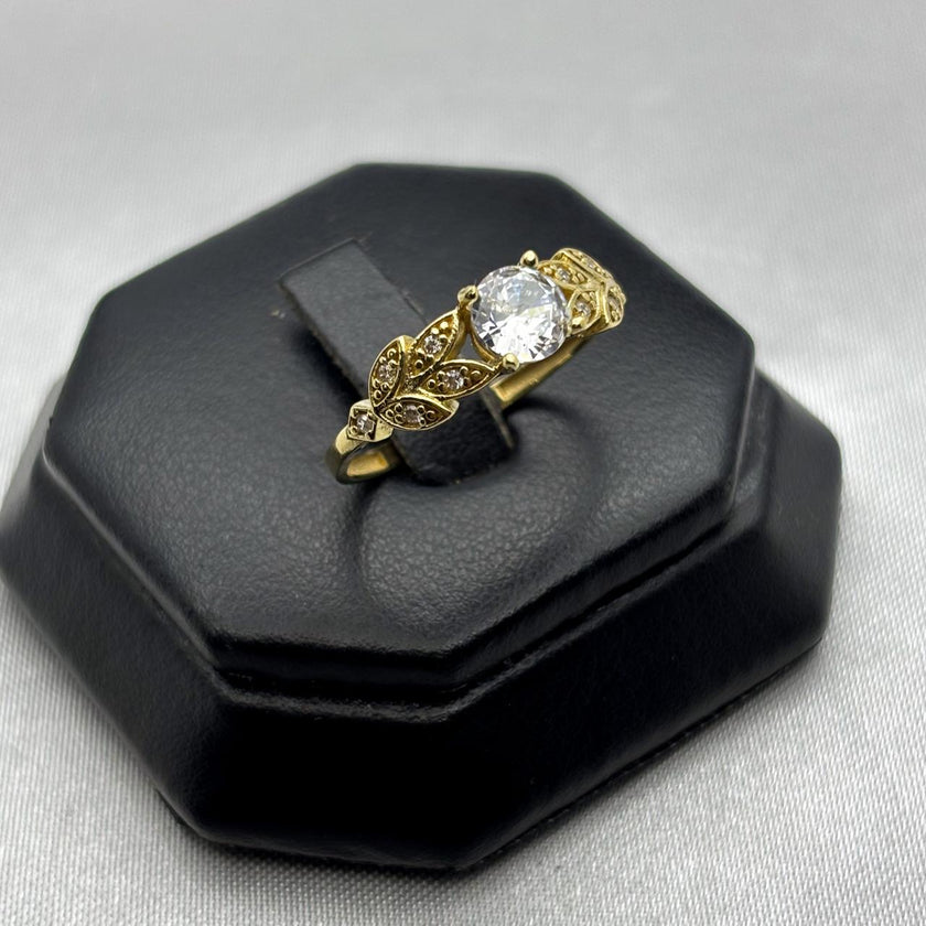 #AD10144 - Anillo Hojas Piedra Central Zirconia Oro 10K - I05/2.5