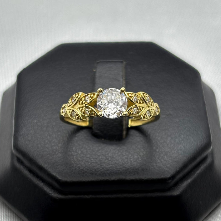 #AD10144 - Anillo Hojas Piedra Central Zirconia Oro 10K - I05/2.5