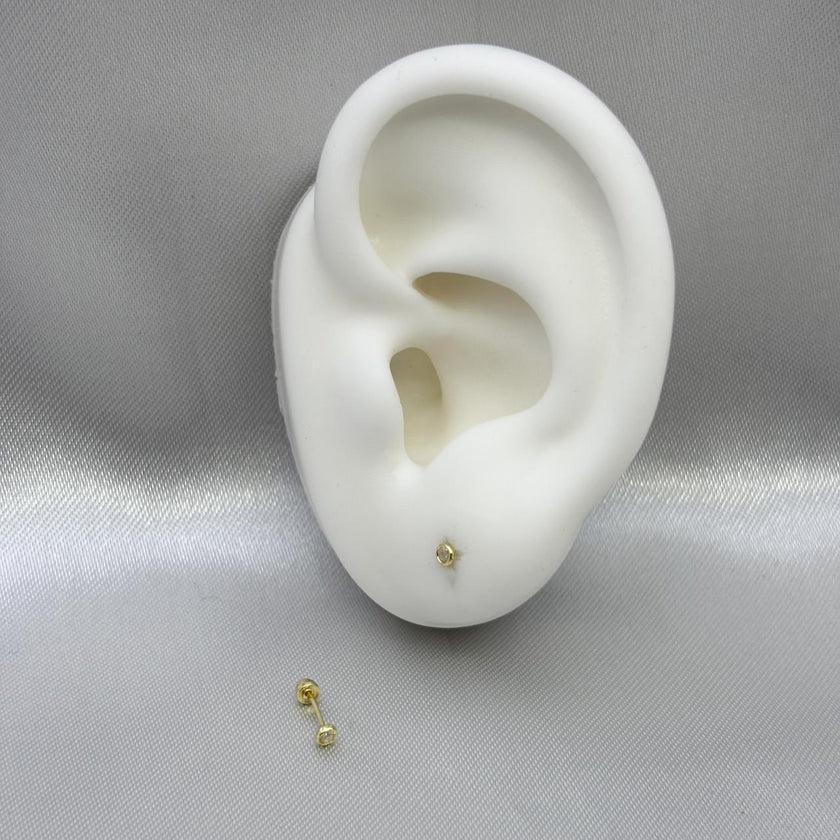 #B10104 - Broquel De Bisel Redondo Piedra Zirconia Oro 10K - L130/ - L200/