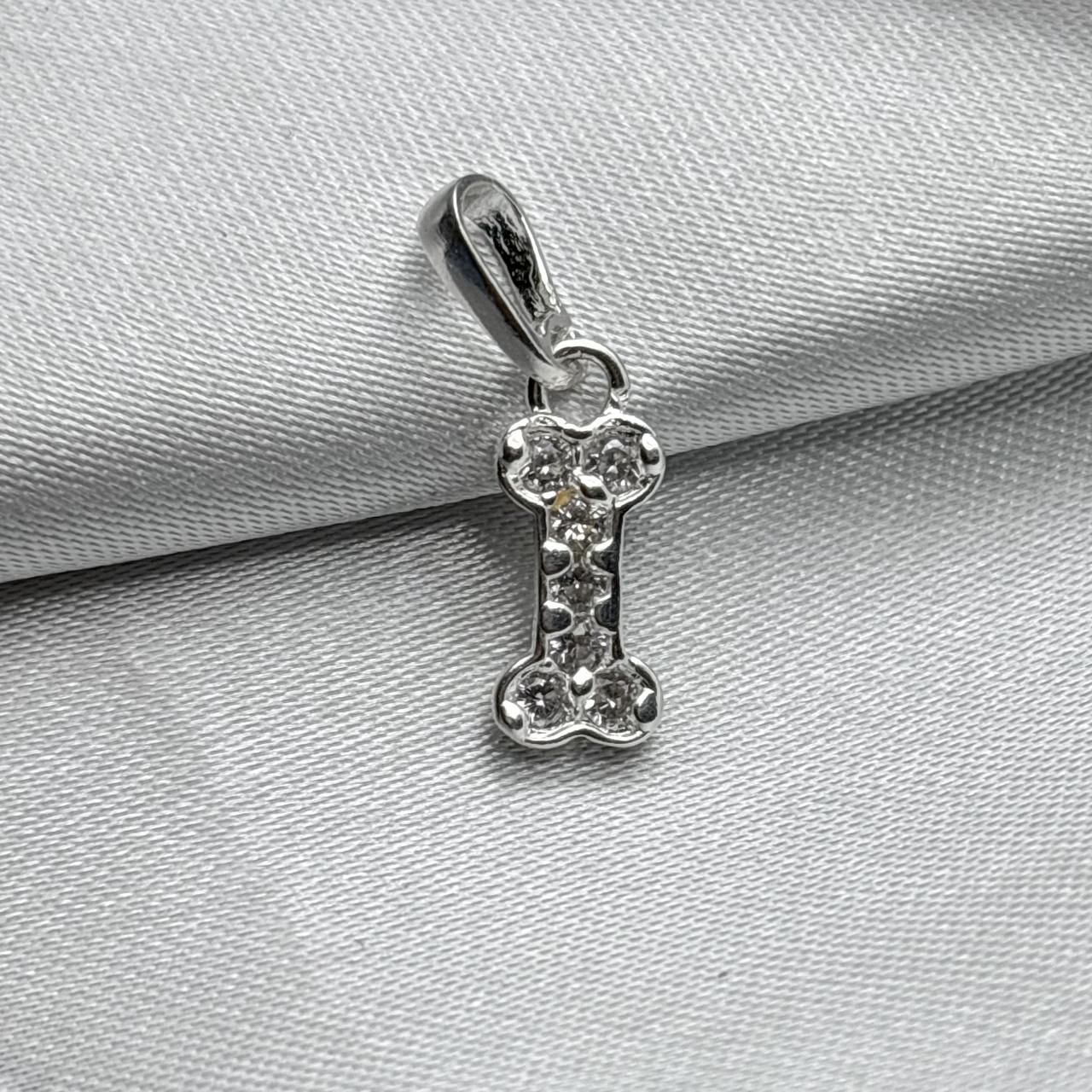 #D146 - Dije De Hueso Con Piedra Zirconia Plata - A09/1.3