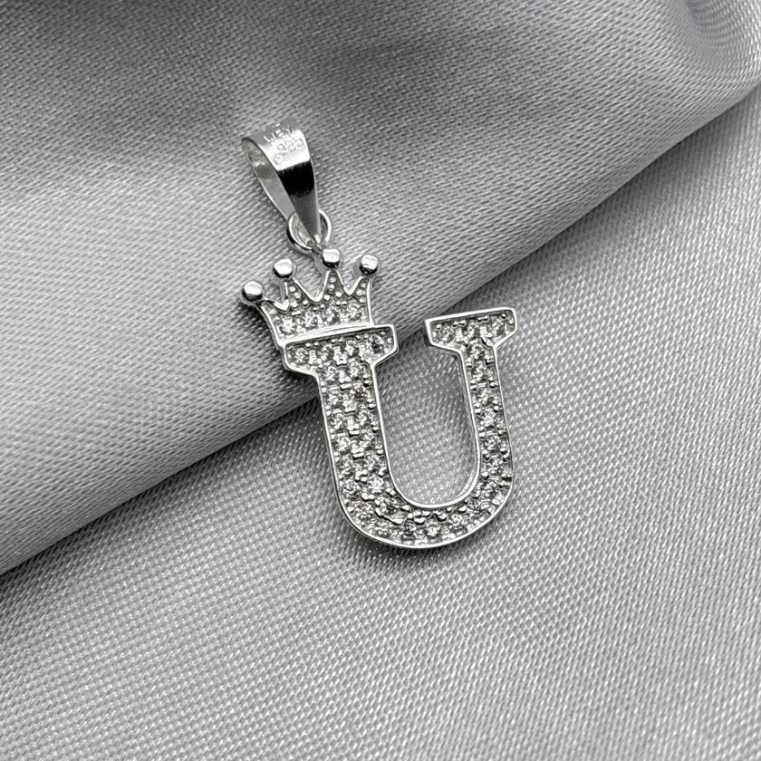 #D593 - Dije Letras Con Corona Y Piedra Zirconia Plata - A09/2.5