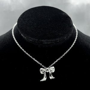 #G244 - Gargantilla Dije Moño Plata - IP3.1