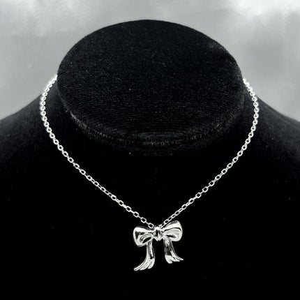 #G244 - Gargantilla Dije Moño Plata - C25/3.1