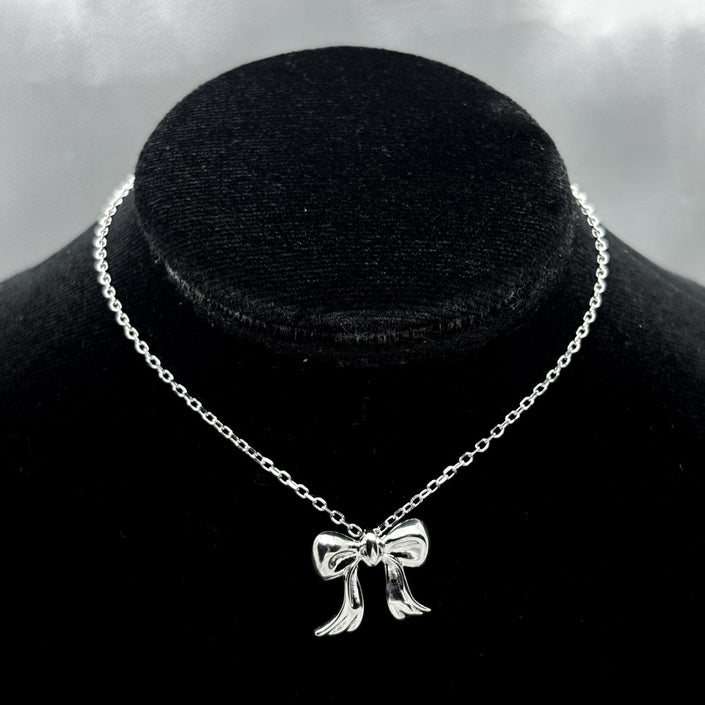 #G244 - Gargantilla Dije Moño Plata - IP3.1