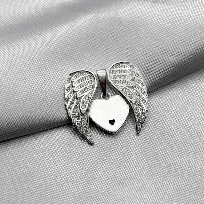 #D552 - Dije Corazon Alas con Piedras Zirconias Plata  - PU2.7