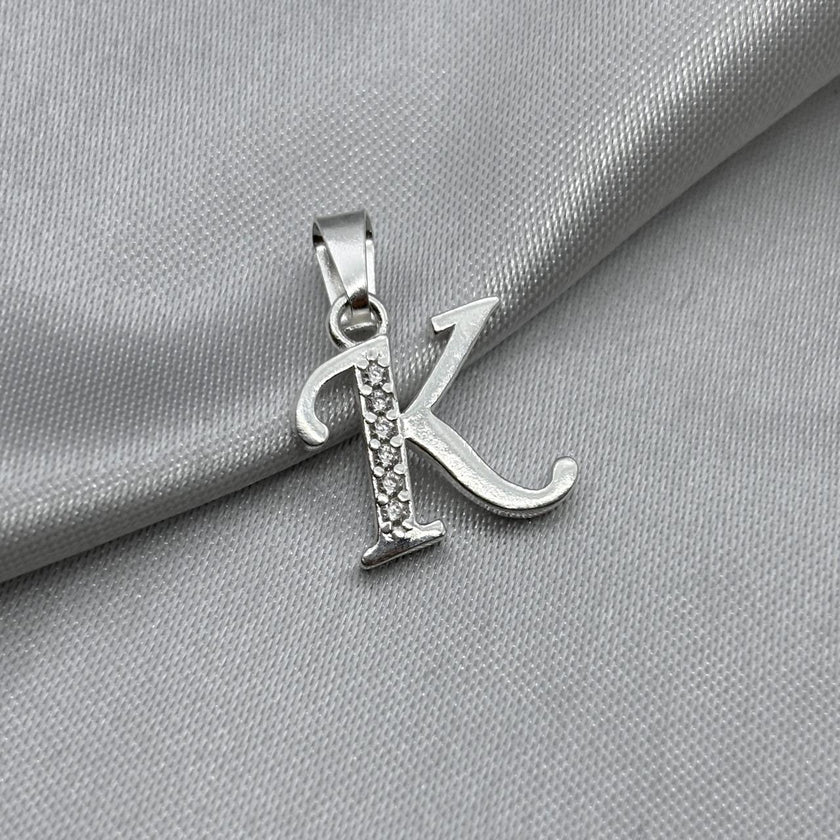 #D561 - Dije Letras Con Zirconia Plata- B09/1.5