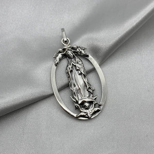 #D599 - Dije Virgen De Guadalupe Querubines Plata Pavonada - A13/6.7
