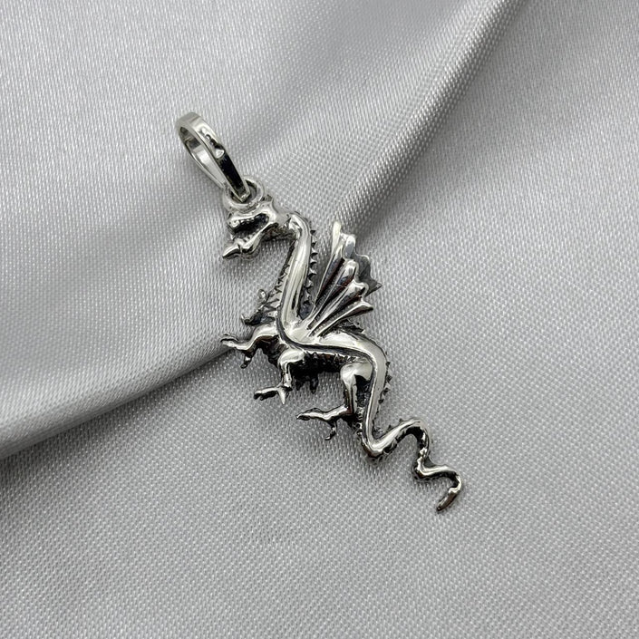 #D604 - Dije Dragón Plata Pavonada - A13/4.4