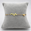 PAL234 - Pulsera Con Pulso Y Corazón De Acero Laminado 18k - LB025/